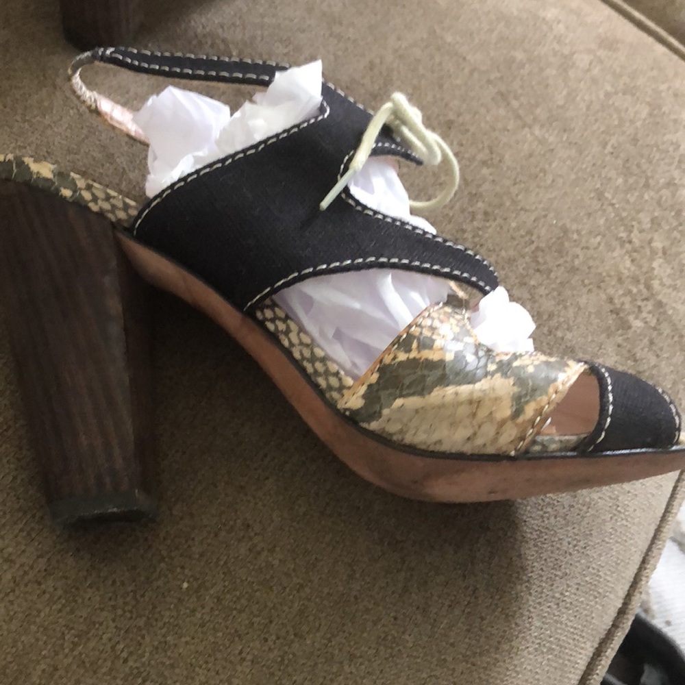 Beautiful snake and material shoe. Size 38 1/2. Just stunning on . 8 1/2.